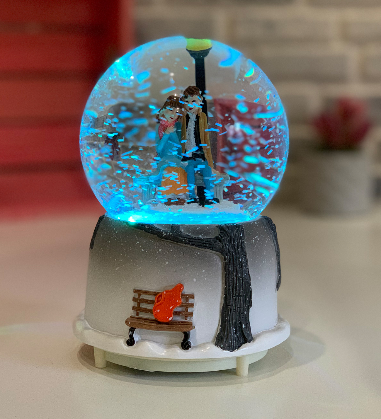 Couple Sitting on Bench Gift Snow Globe with Lights and Music