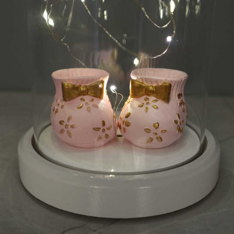 Illuminated glass fanus pink baby shoes figured lamp