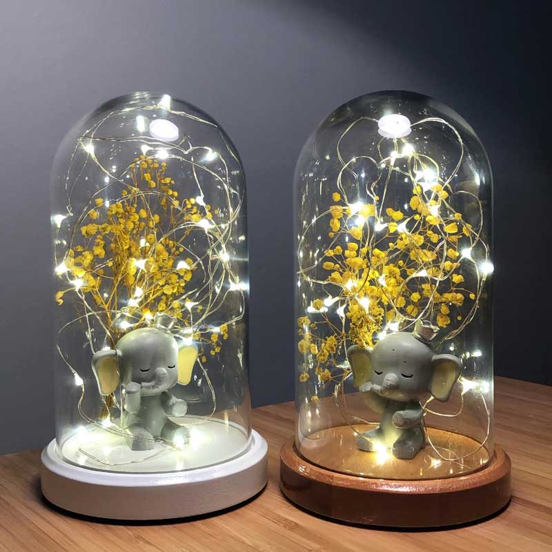 Illuminated Glass Fanus Yellow Ear Elephant and Flower Figure Lamp
