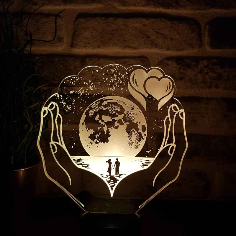 The Planet LED Night Light in Your Hands