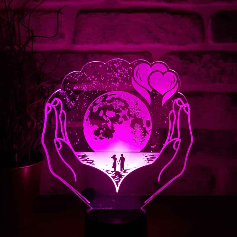 The Planet LED Night Light in Your Hands