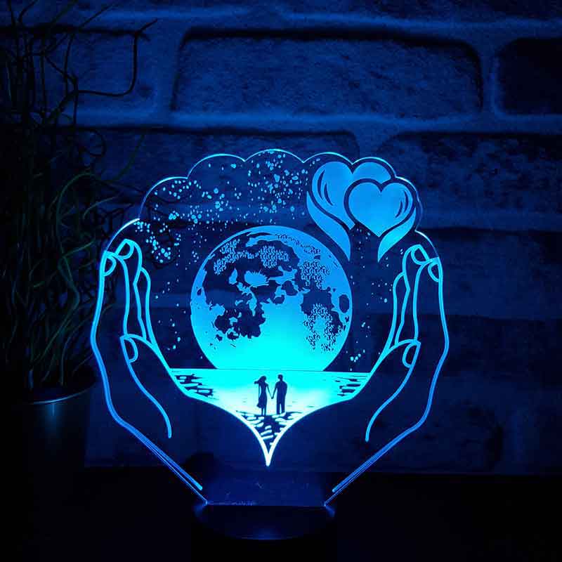 The Planet LED Night Light in Your Hands