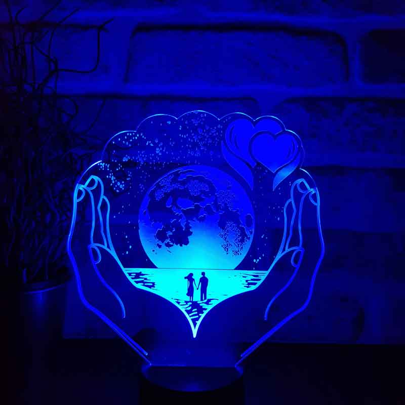 The Planet LED Night Light in Your Hands