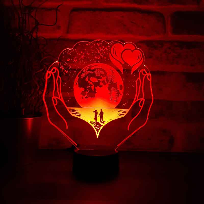 The Planet LED Night Light in Your Hands