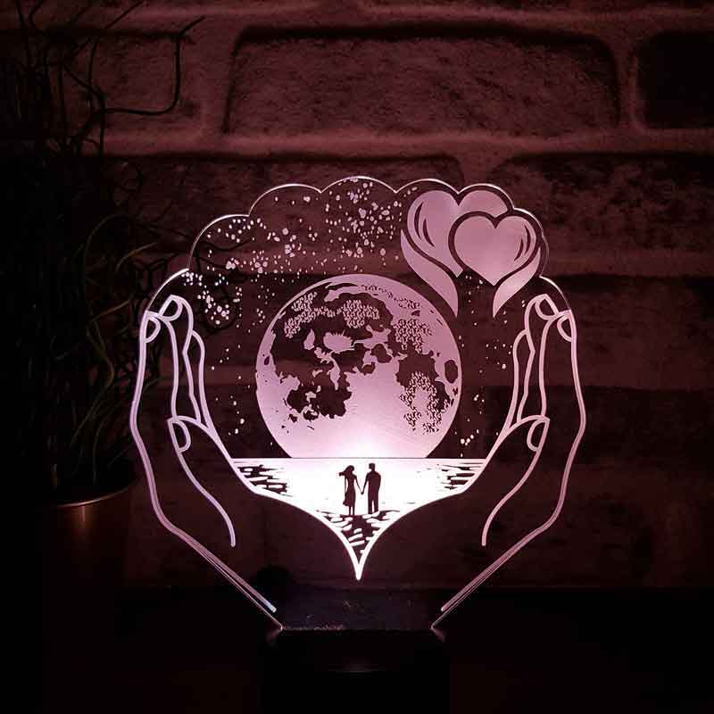 The Planet LED Night Light in Your Hands