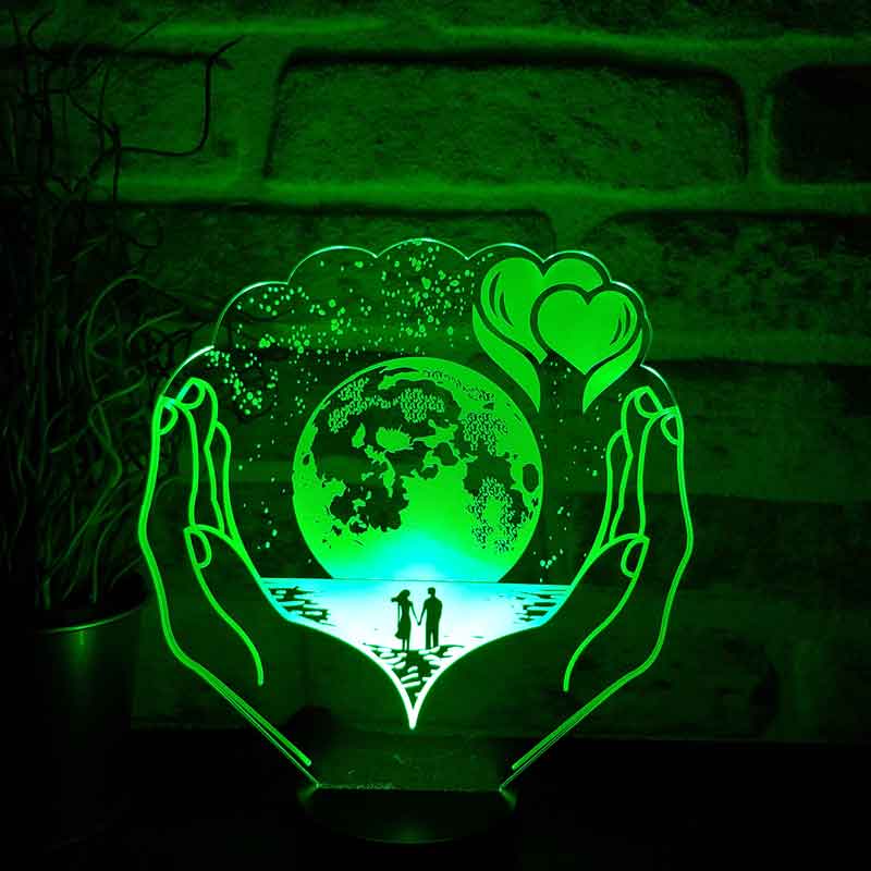 The Planet LED Night Light in Your Hands