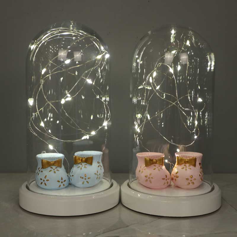 Illuminated glass fanus pink baby shoes figured lamp