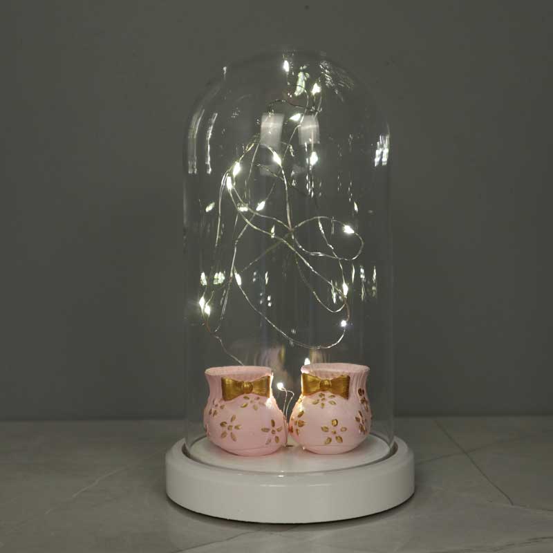 Illuminated glass fanus pink baby shoes figured lamp