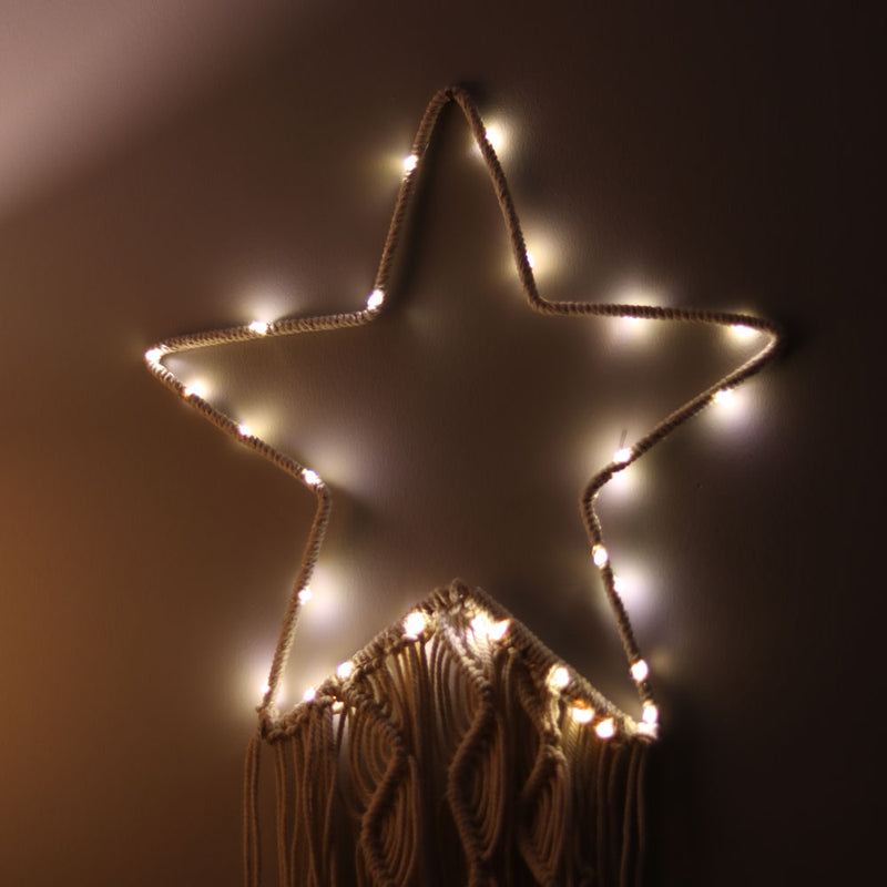 Andrómeda estrella iluminada hecha a mano